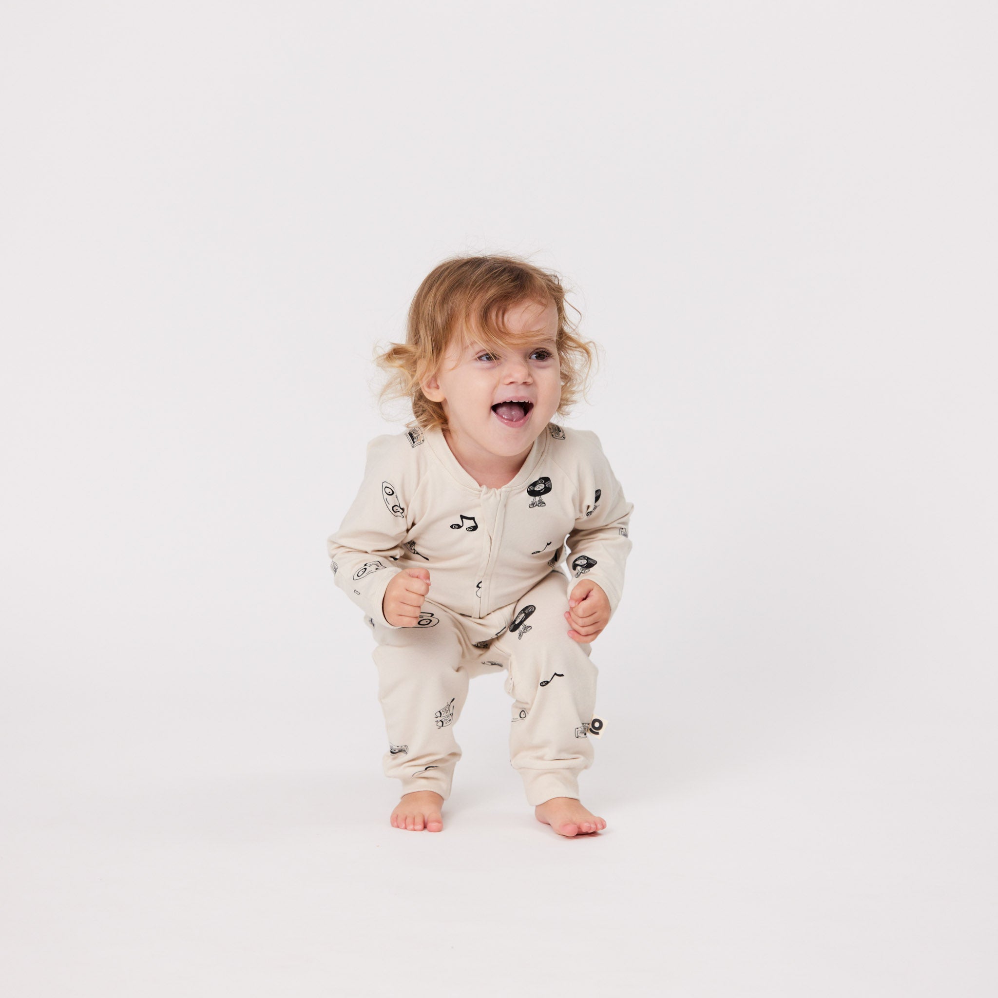Groovy groms organic sleepsuit